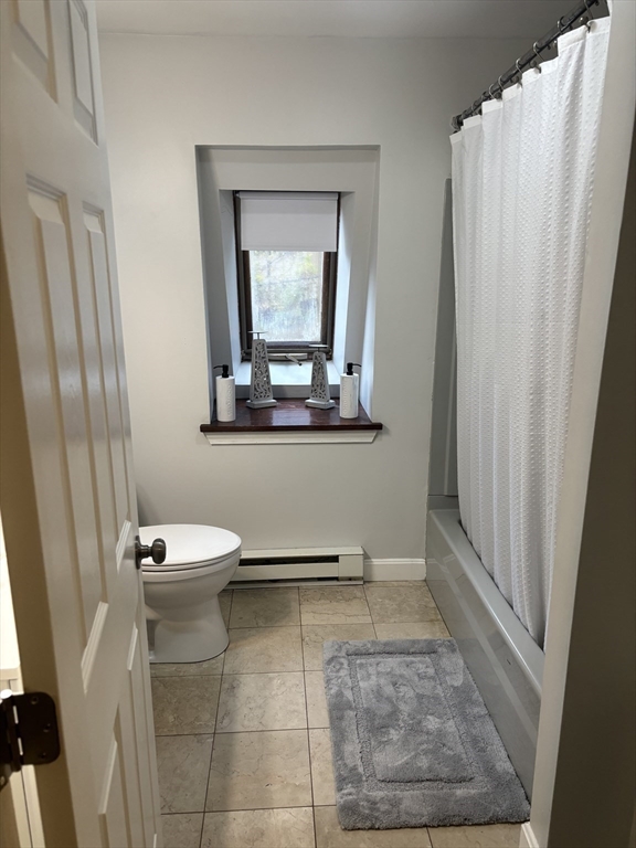 13 Dock Lane Salisbury, MA 01952 - Photo 13 of 23 a bathroom with a toilet and a mirror