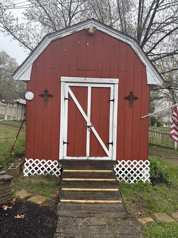 13 Dock Lane Salisbury, MA 01952 - Photo 3 of 23 a front view of a house with a yard