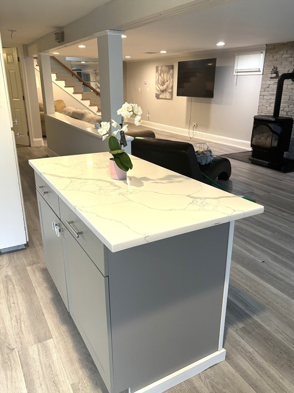 13 Dock Lane Salisbury, MA 01952 - Photo 6 of 23 a large kitchen with a sink a counter top space and stainless steel appliances
