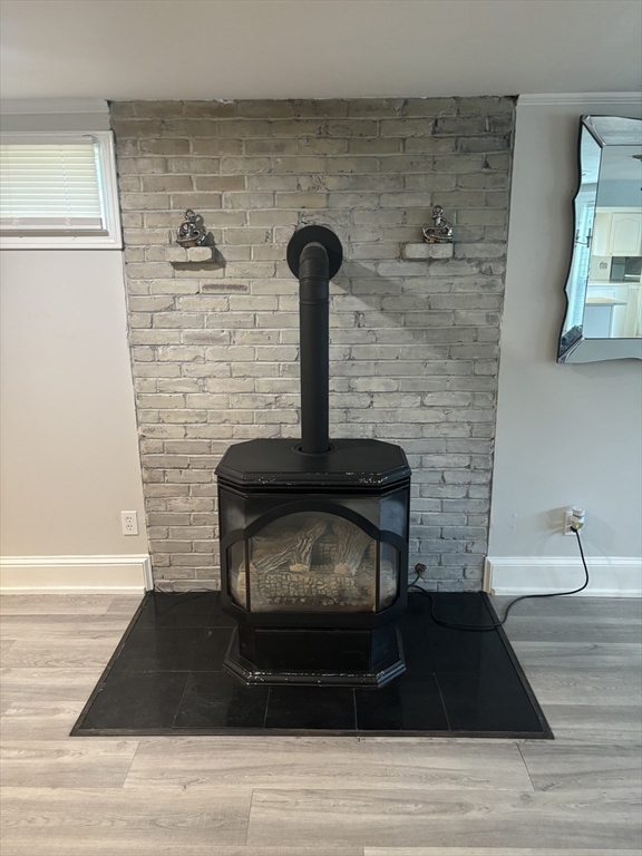 13 Dock Lane Salisbury, MA 01952 - Photo 7 of 23 a living room with furniture and a fireplace