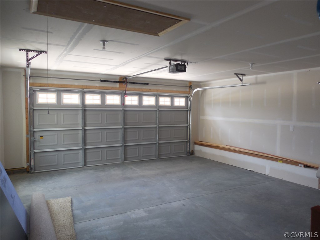 3315 Kennington Park Road, Unit M2 Aylett, VA 23009 - Photo 14 of 14 20 x 22 garage with pull down attic for storage