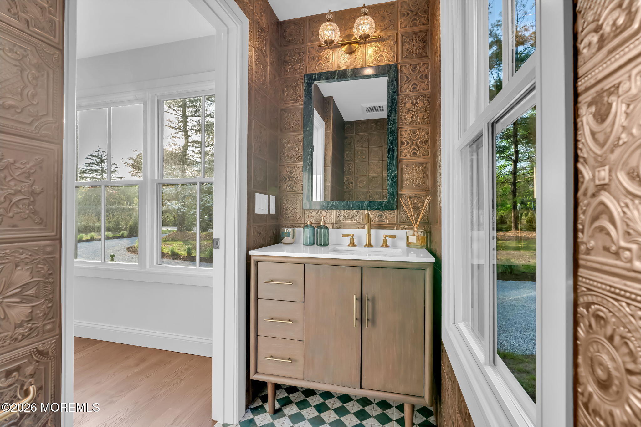 181 Rumson Road Rumson, NJ 07760 - Photo 28 of 79 a bathroom with a tub sink and mirror
