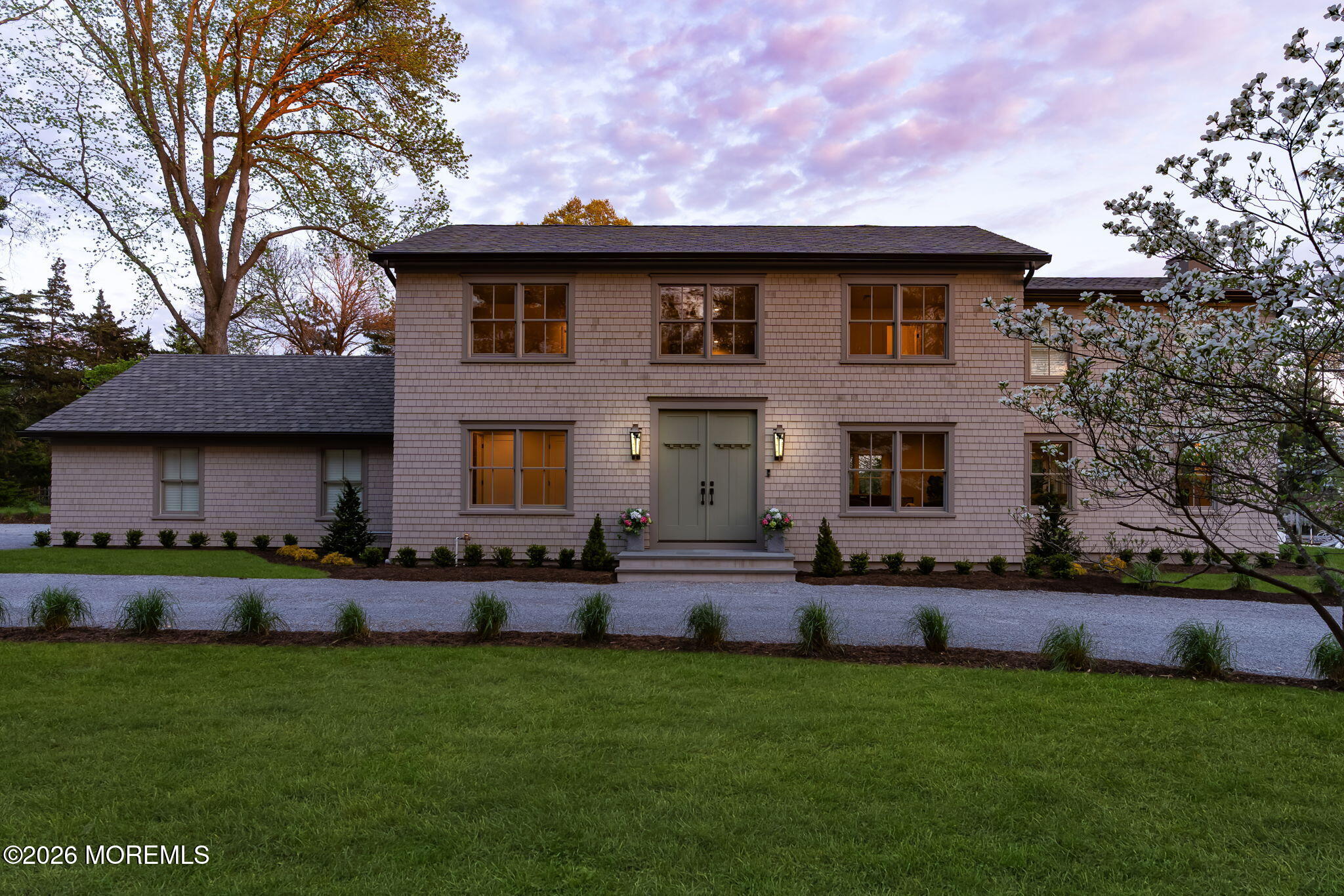 181 Rumson Road Rumson, NJ 07760 - Photo 3 of 79 a front view of house with yard and outdoor seating