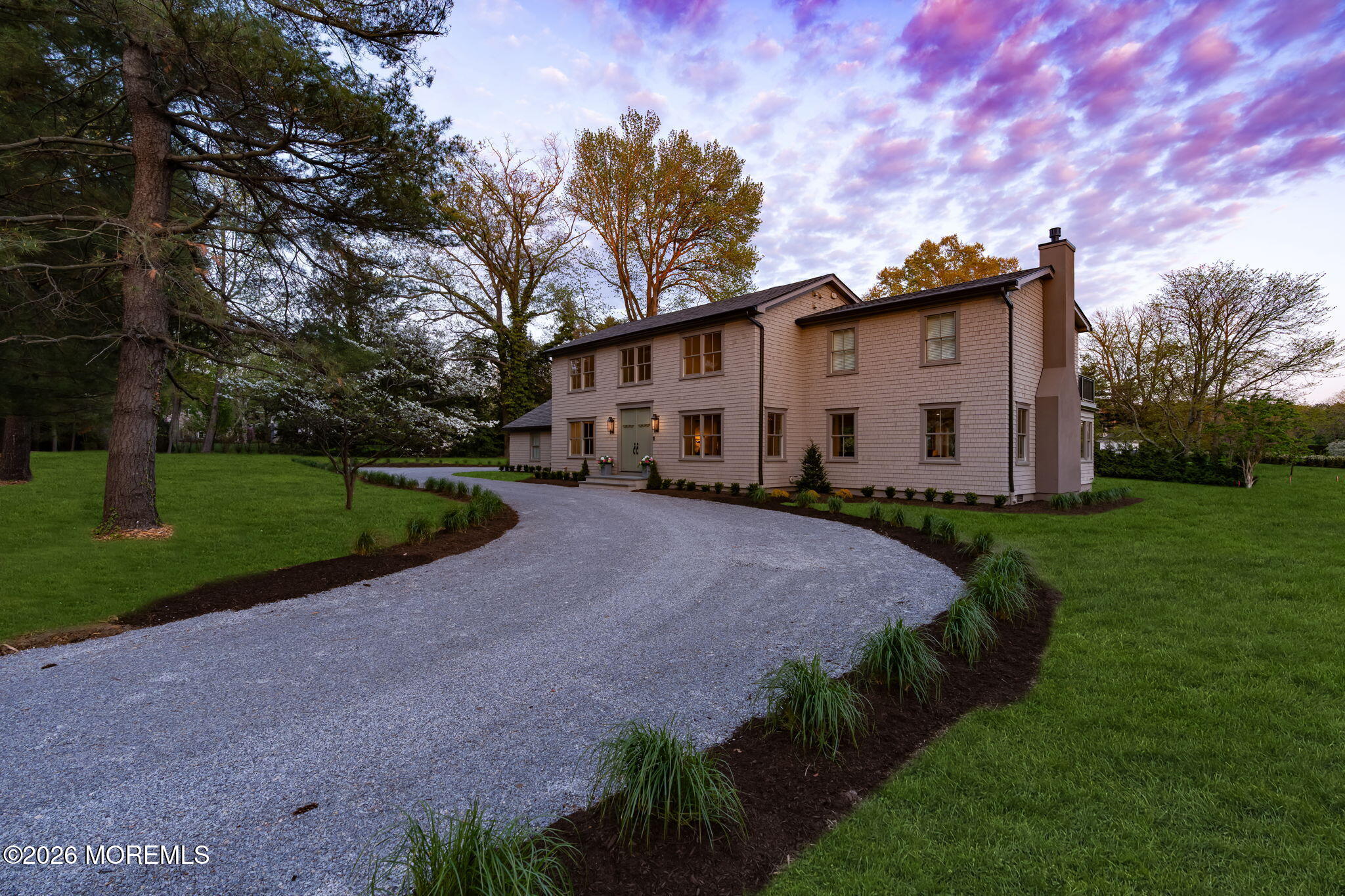 181 Rumson Road Rumson, NJ 07760 - Photo 4 of 79 a white house with a big yard and large trees
