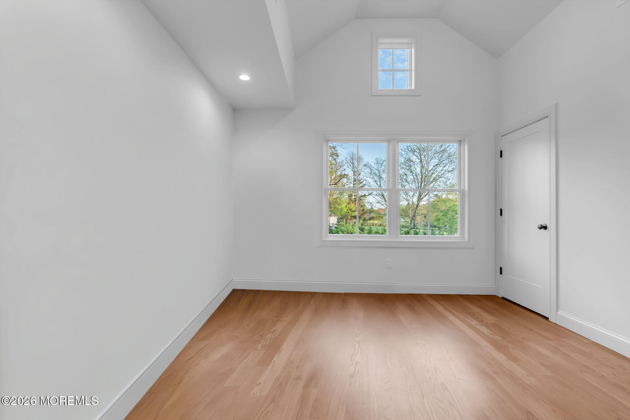 181 Rumson Road Rumson, NJ 07760 - Photo 43 of 79 an empty room with wooden floor and windows