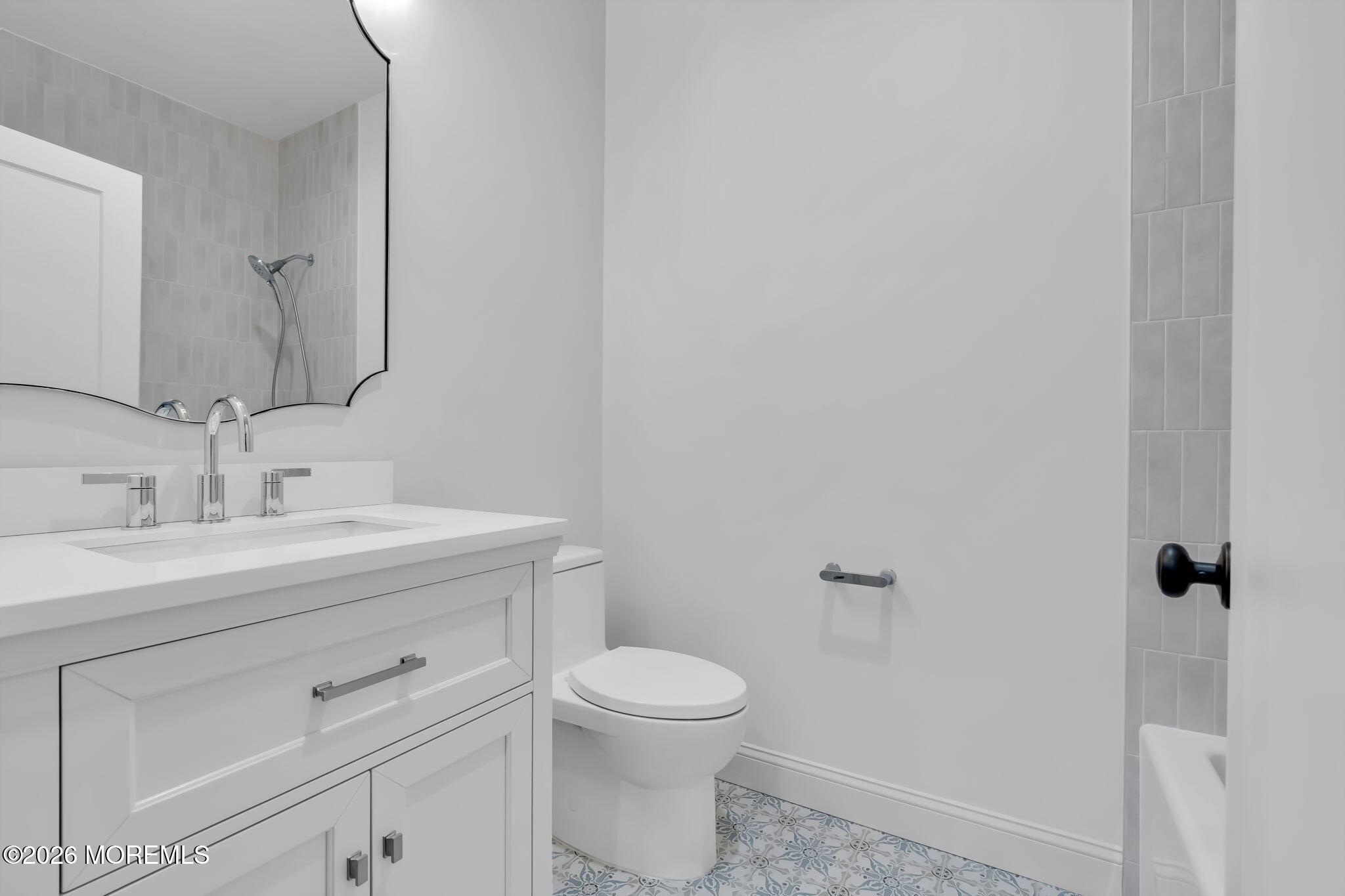 181 Rumson Road Rumson, NJ 07760 - Photo 44 of 79 a bathroom with a toilet a sink and mirror