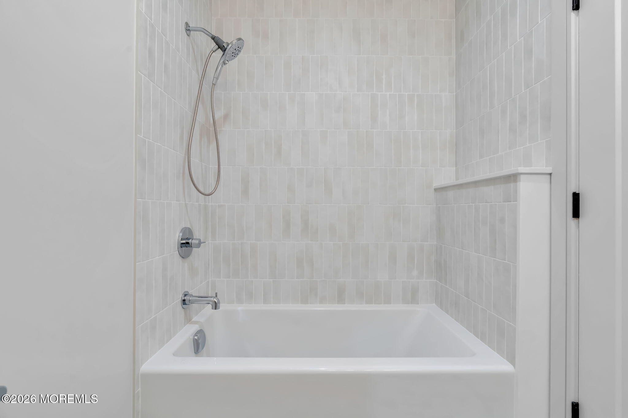 181 Rumson Road Rumson, NJ 07760 - Photo 45 of 79 a white bath tub with a shower
