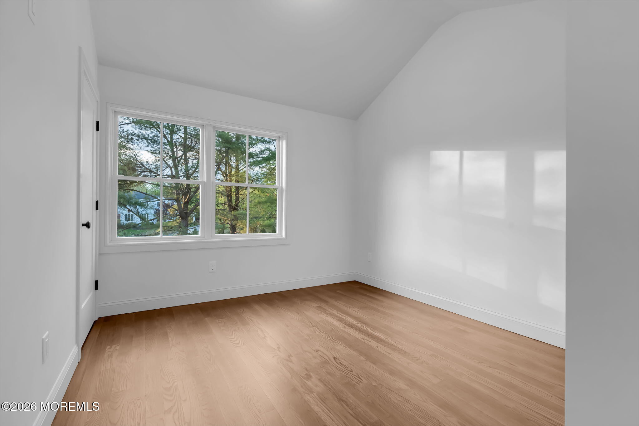 181 Rumson Road Rumson, NJ 07760 - Photo 48 of 79 an empty room with wooden floor and windows