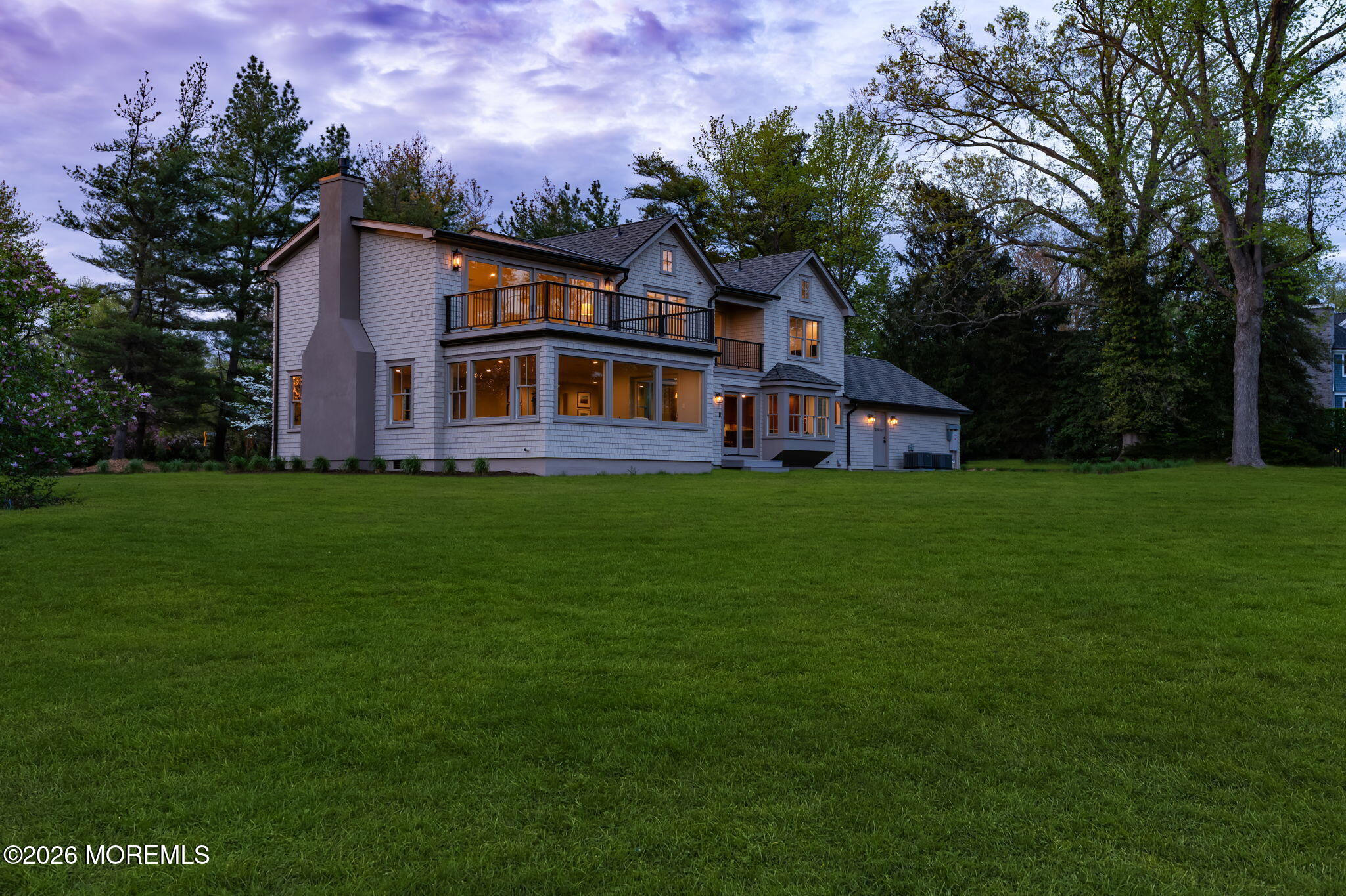 181 Rumson Road Rumson, NJ 07760 - Photo 55 of 79 a front view of a house with a garden