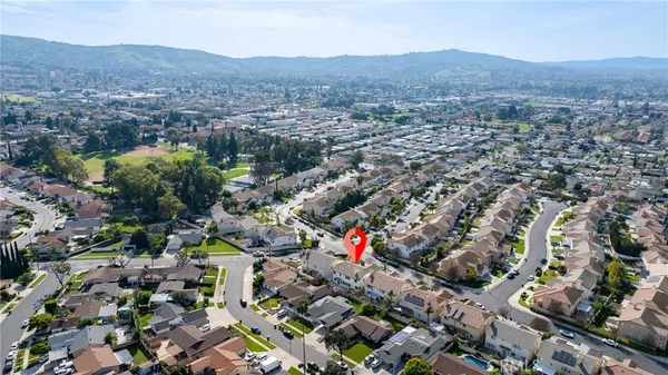 a view of a city with mountains in the background