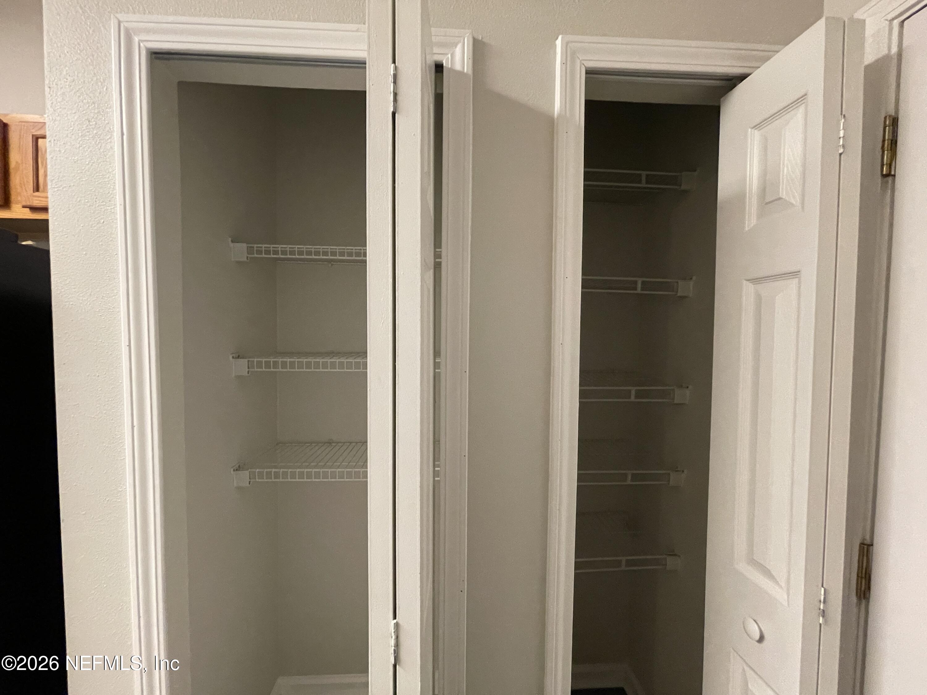 7931 Melvin Road Jacksonville, FL 32210 - Photo 10 of 18 a bathroom with a glass door shower and a sink