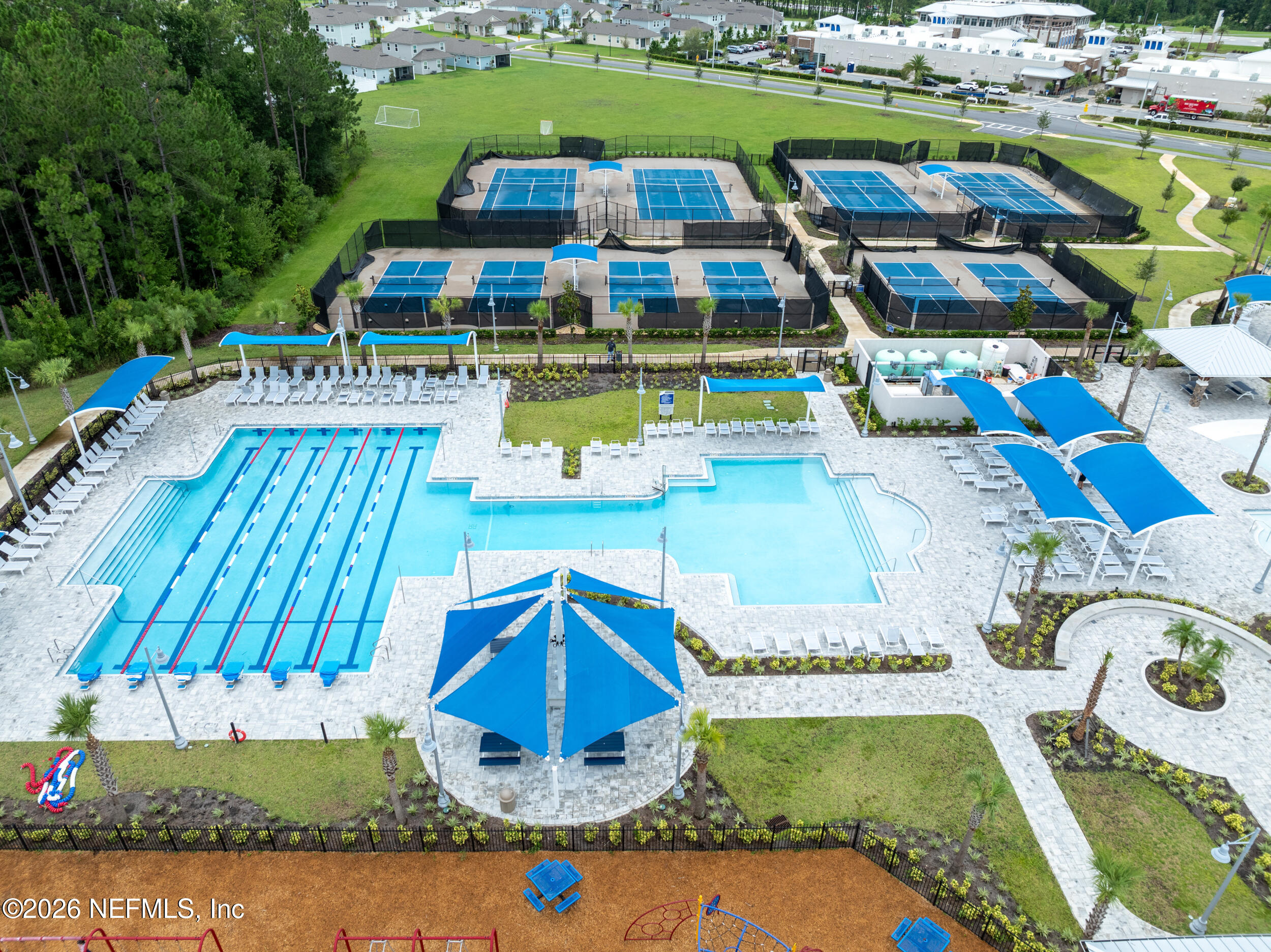 57 Cedar Elm Way St. Augustine, FL 32092 - Photo 51 of 65 a view of swimming pool with outdoor seating