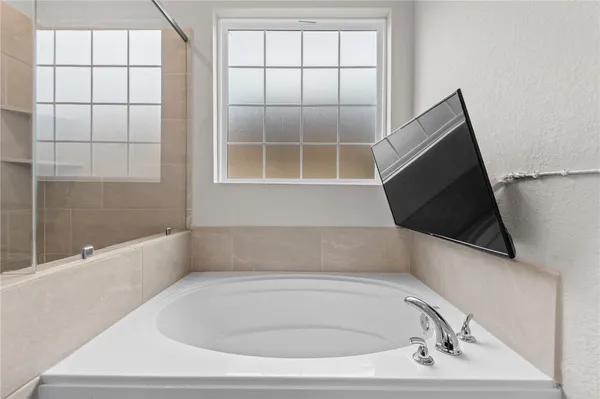 a bathroom with a bathtub