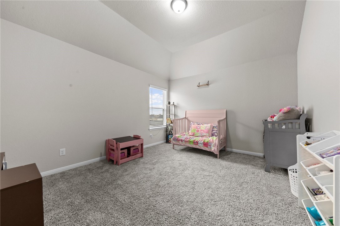 1906 Longmire Loop Temple, TX 76502 - Photo 22 of 32 a room with furniture and a flat screen tv