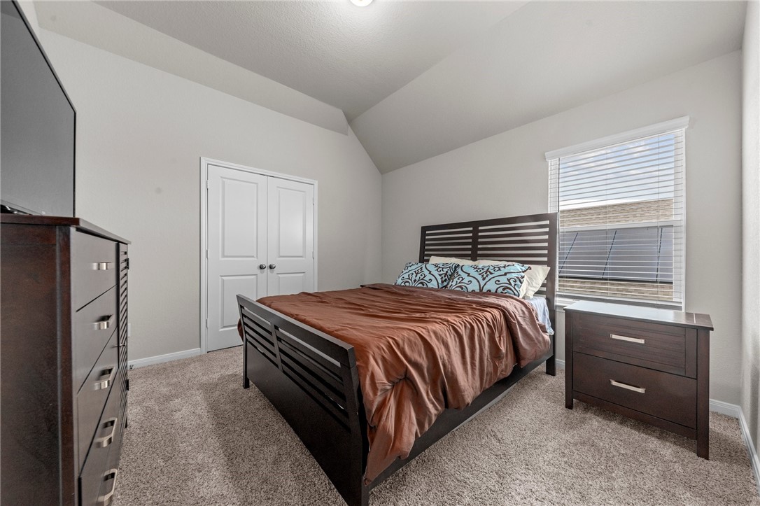 1906 Longmire Loop Temple, TX 76502 - Photo 24 of 32 a bedroom with a bed and a closet