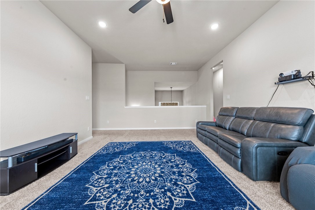 1906 Longmire Loop Temple, TX 76502 - Photo 29 of 32 a living room with furniture and a rug