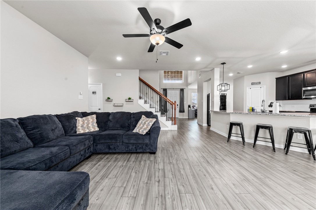 1906 Longmire Loop Temple, TX 76502 - Photo 5 of 32 a living room with furniture and wooden floor
