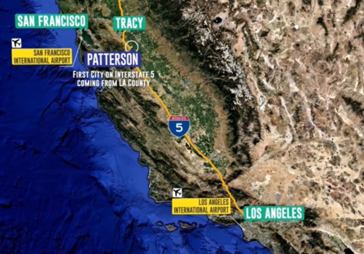 a sign that is on a brick wall