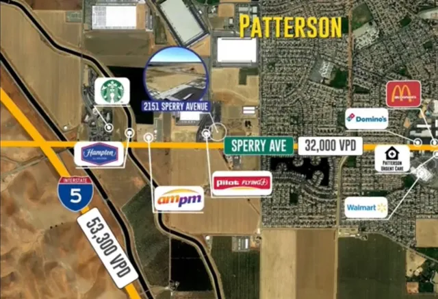 a street sign on a brick wall