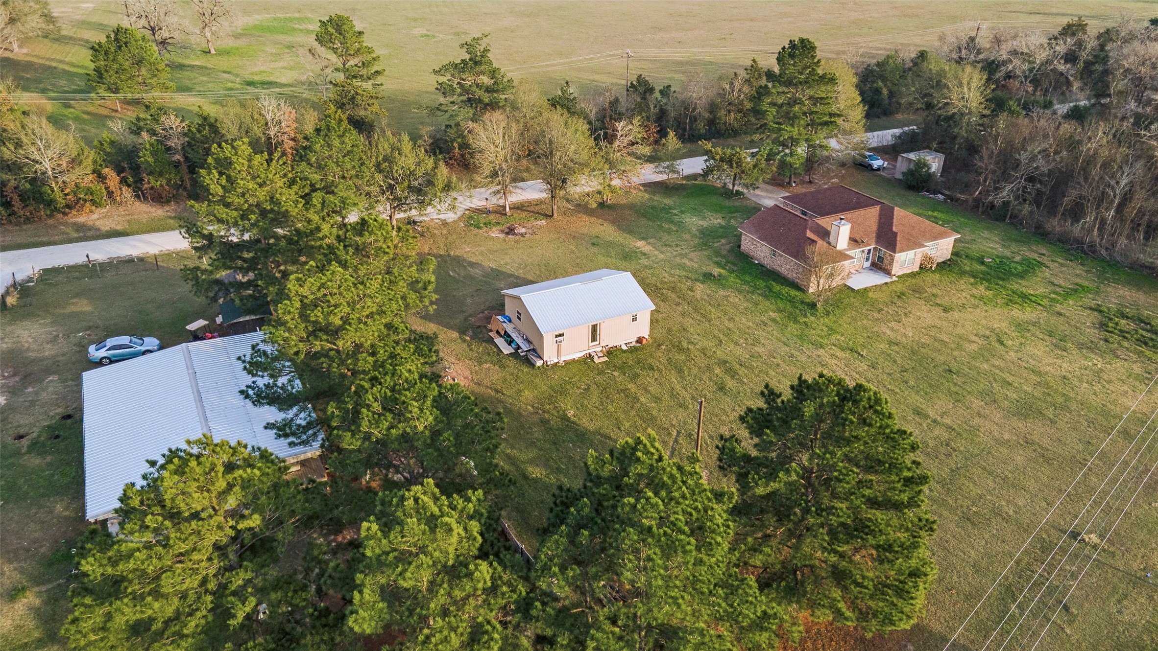 25 Pine Prairie School Road Huntsville, TX 77320 - Photo 15 of 15 an aerial view of a house with a yard