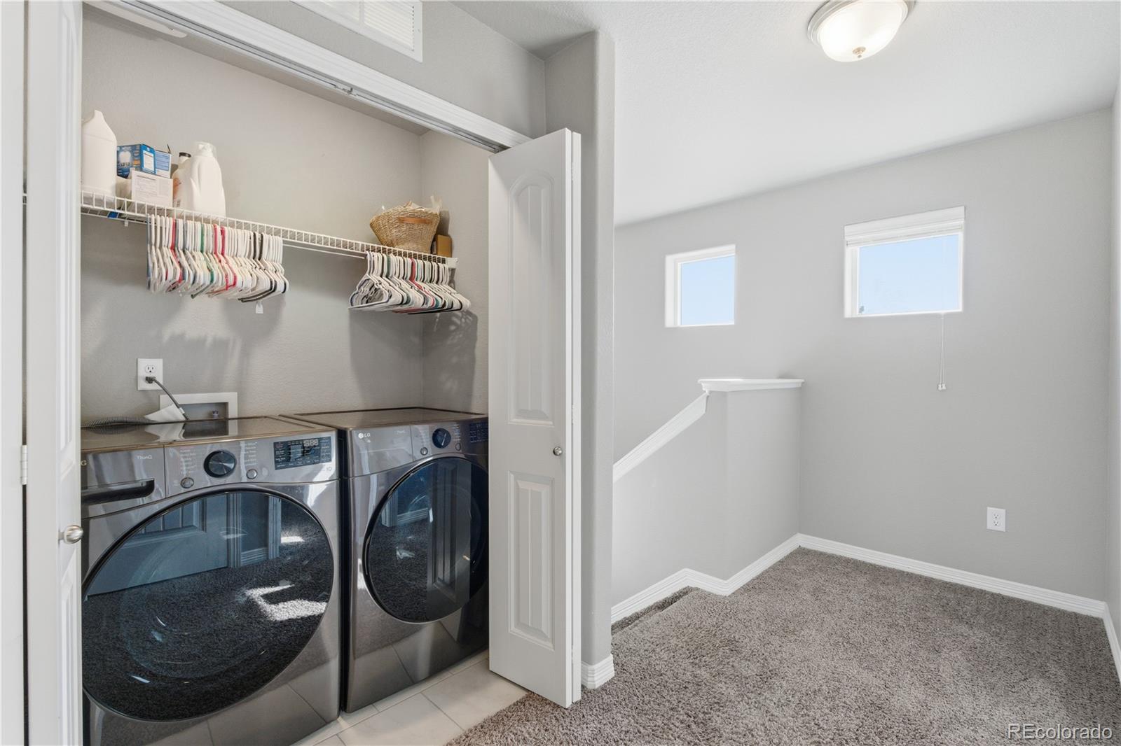 2173 Angus Street Mead, CO 80542 - Photo 20 of 28 a utility room with dryer and washer