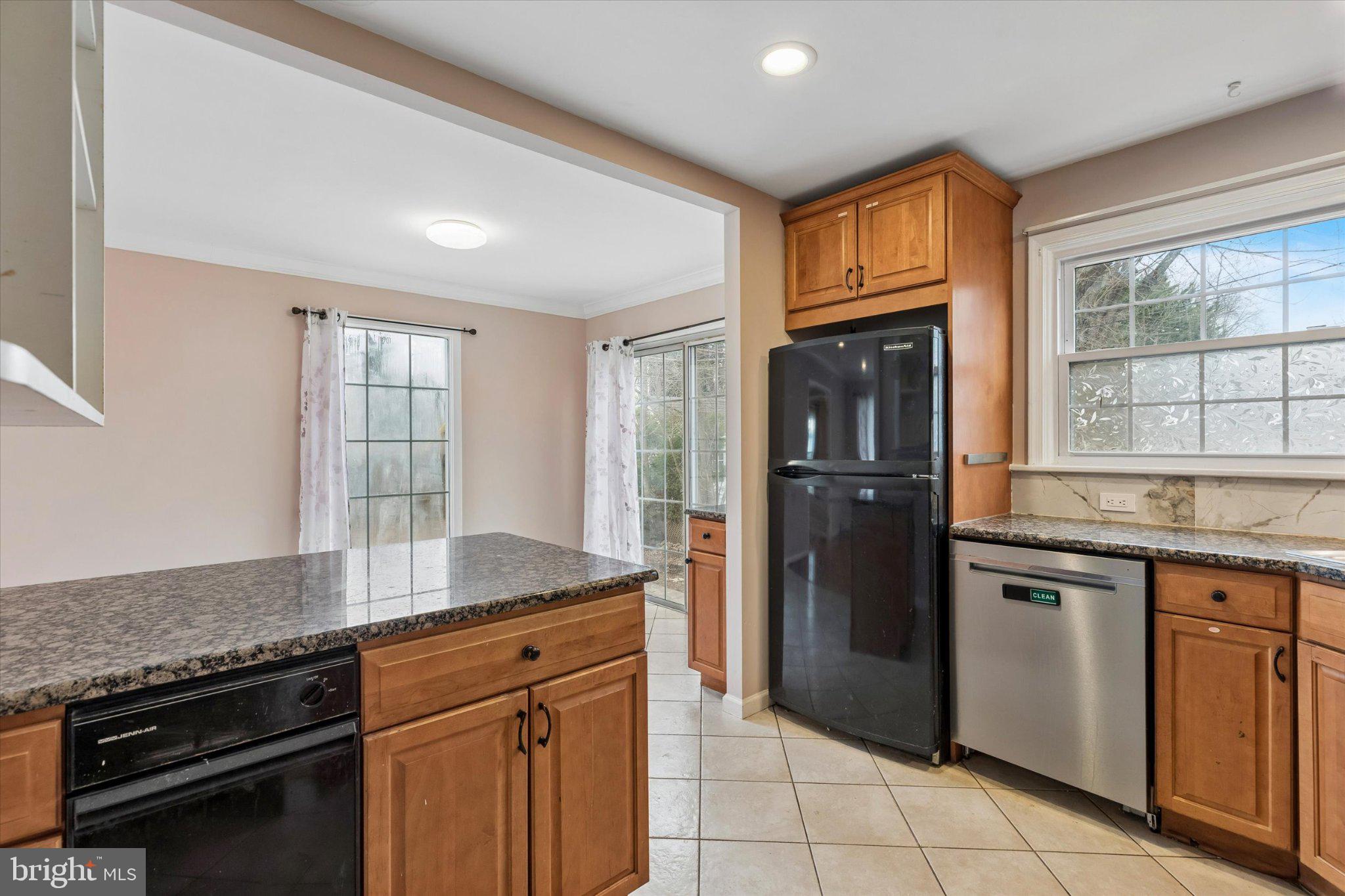 4150 Orangemans Road Hatboro, PA 19040 - Photo 12 of 25 a kitchen with stainless steel appliances granite countertop a refrigerator and a sink