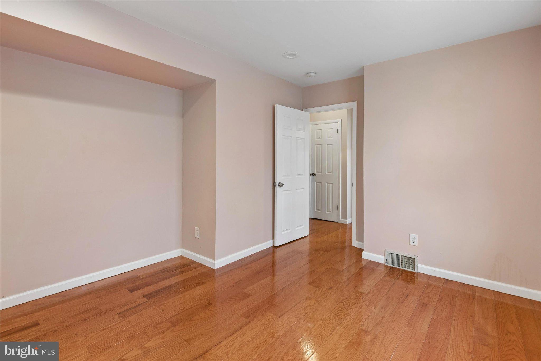 4150 Orangemans Road Hatboro, PA 19040 - Photo 18 of 25 a view of an empty room with wooden floor