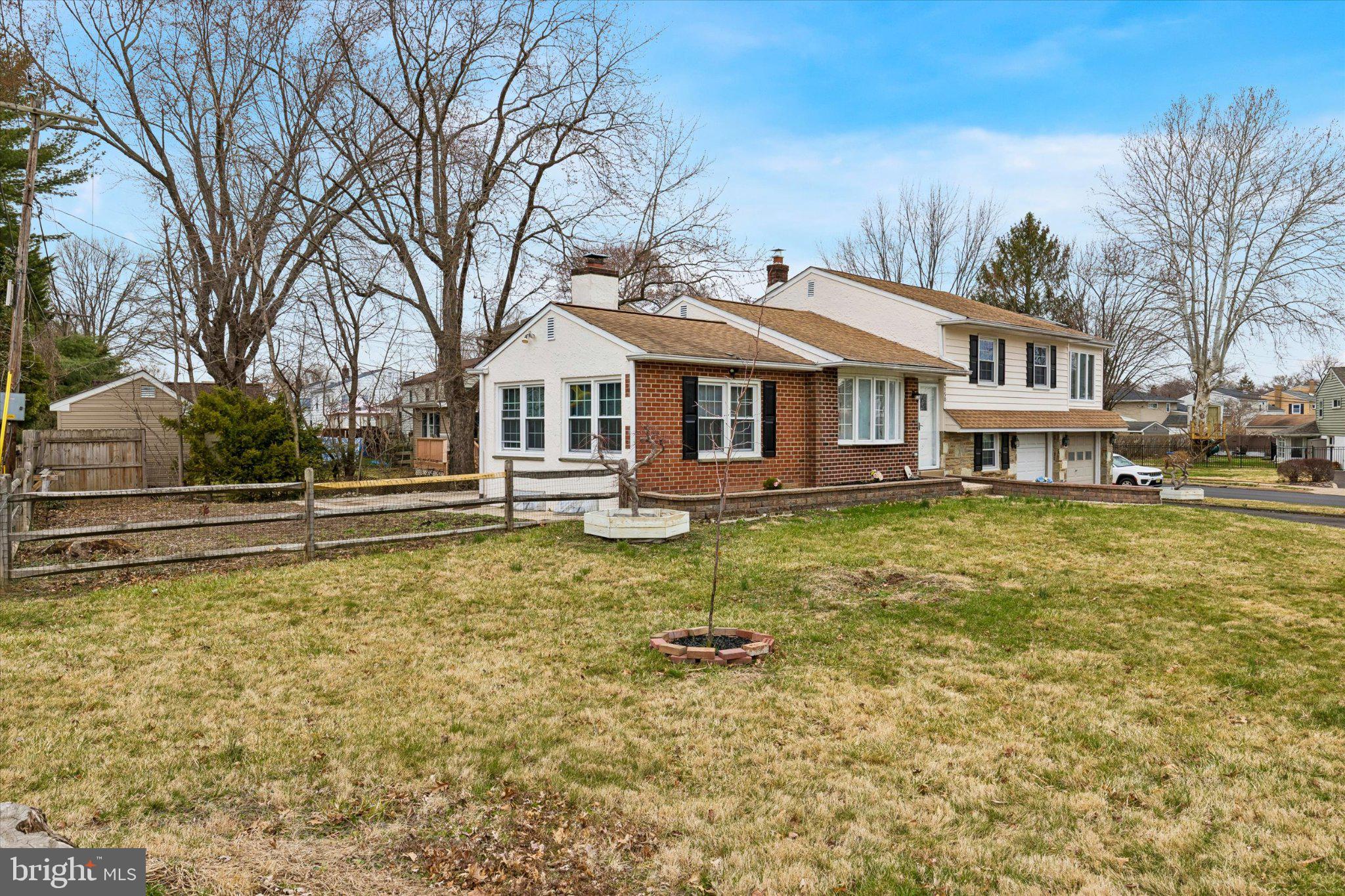 4150 Orangemans Road Hatboro, PA 19040 - Photo 2 of 25 a front view of a house with a yard table and chairs