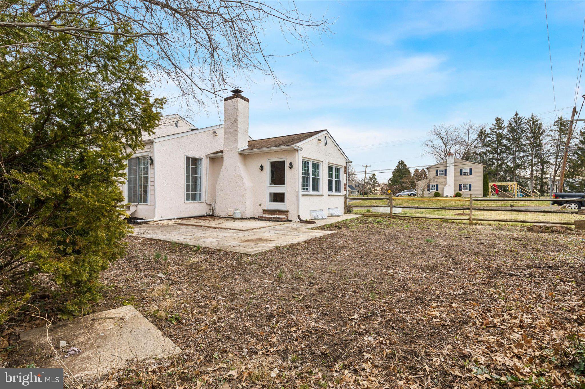 4150 Orangemans Road Hatboro, PA 19040 - Photo 24 of 25 a front view of a house with a yard