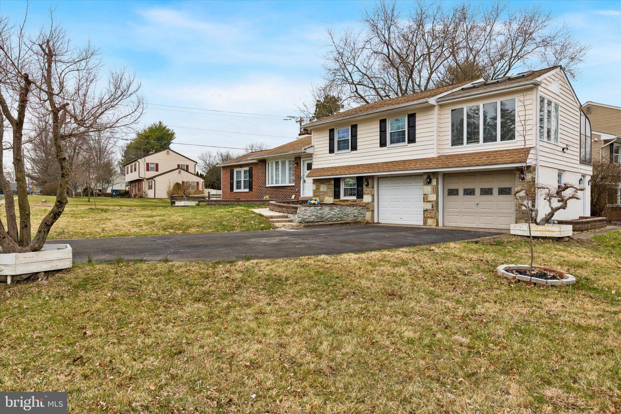 4150 Orangemans Road Hatboro, PA 19040 - Photo 3 of 25 a front view of a house with a yard