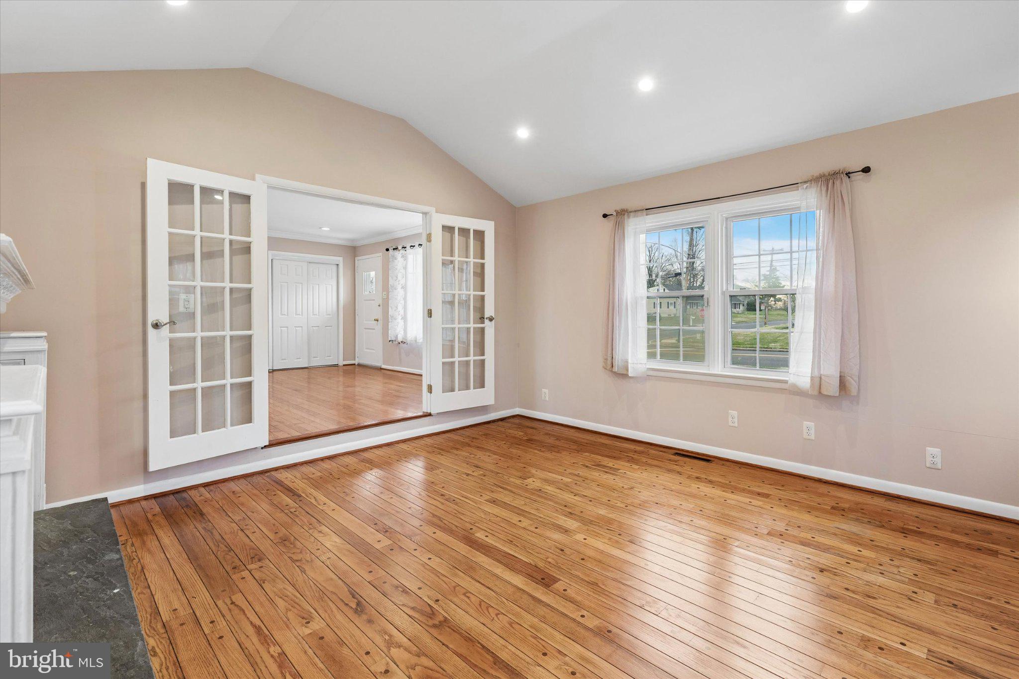 4150 Orangemans Road Hatboro, PA 19040 - Photo 9 of 25 a view of an empty room with wooden floor and a window