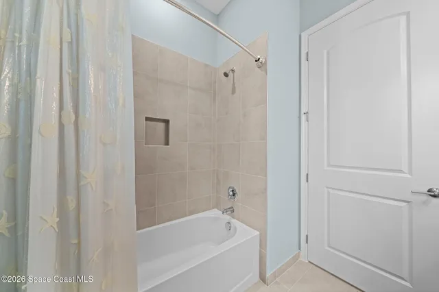 a bathroom with a sink toilet and mirror