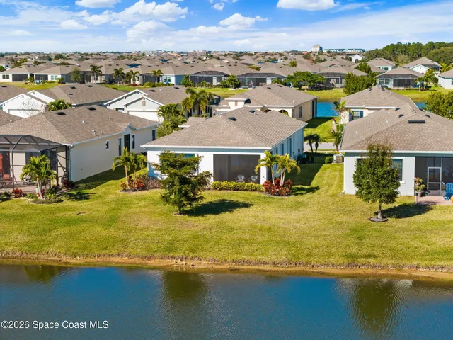a picture of a city with a lake view