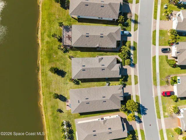 a view of a room with lots of gym equipment