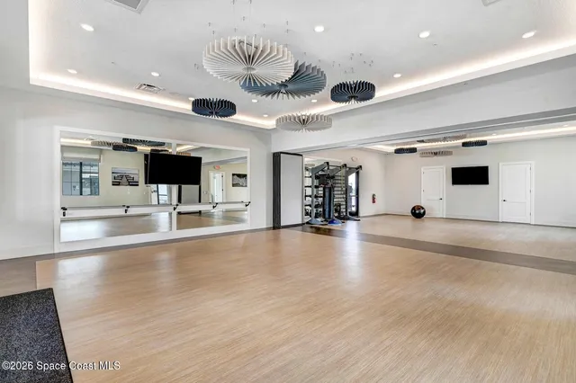 a view of outdoor space with palm trees