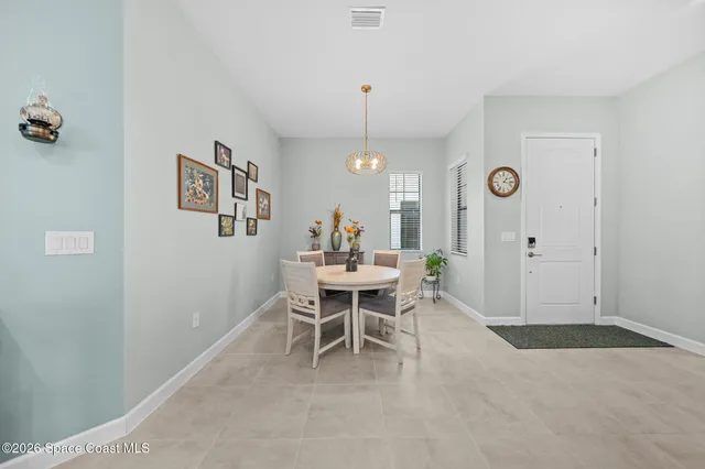a kitchen with stainless steel appliances kitchen island granite countertop a sink and cabinets