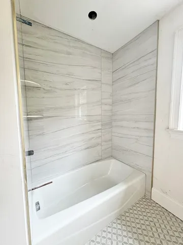 a view of room with washer and dryer