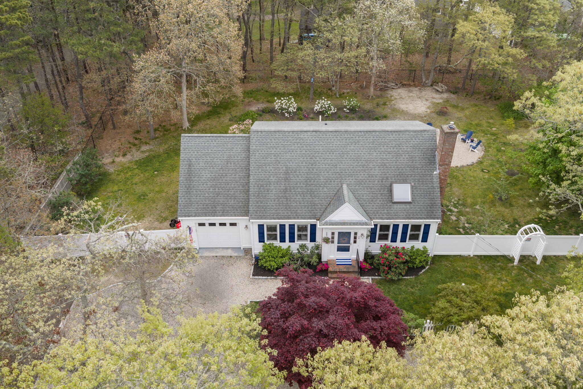 40 Sam Ryder Road Chatham, MA 02633 - Photo 36 of 42 an aerial view of a house with a yard and large tree