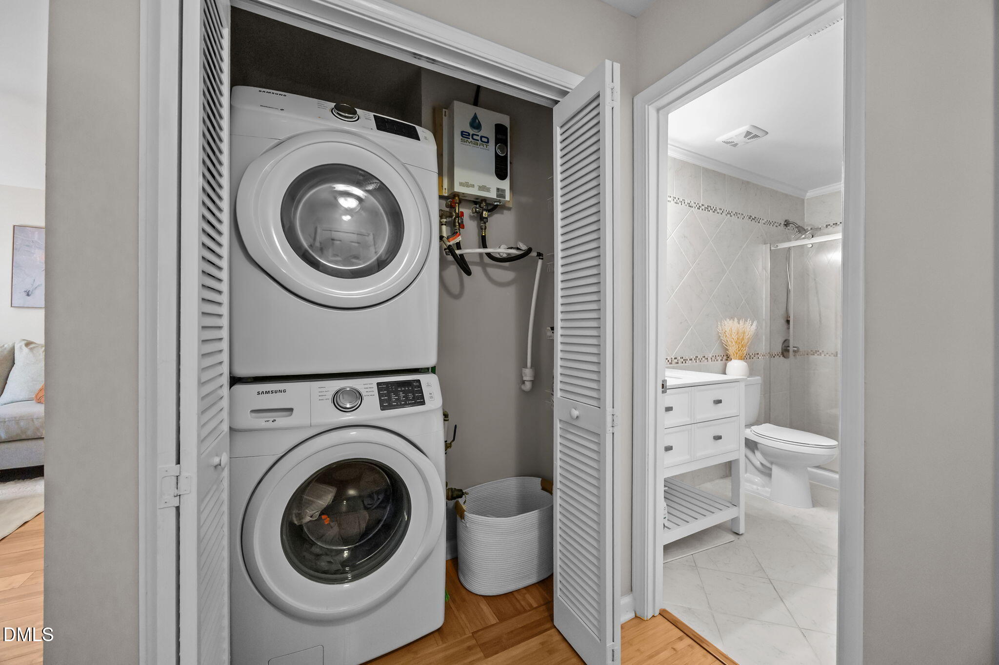 1316 South State Street, Unit D Raleigh, NC 27610 - Photo 14 of 36 a view of a bathroom with washing machine and racks
