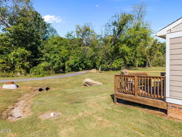 a view of backyard with trees