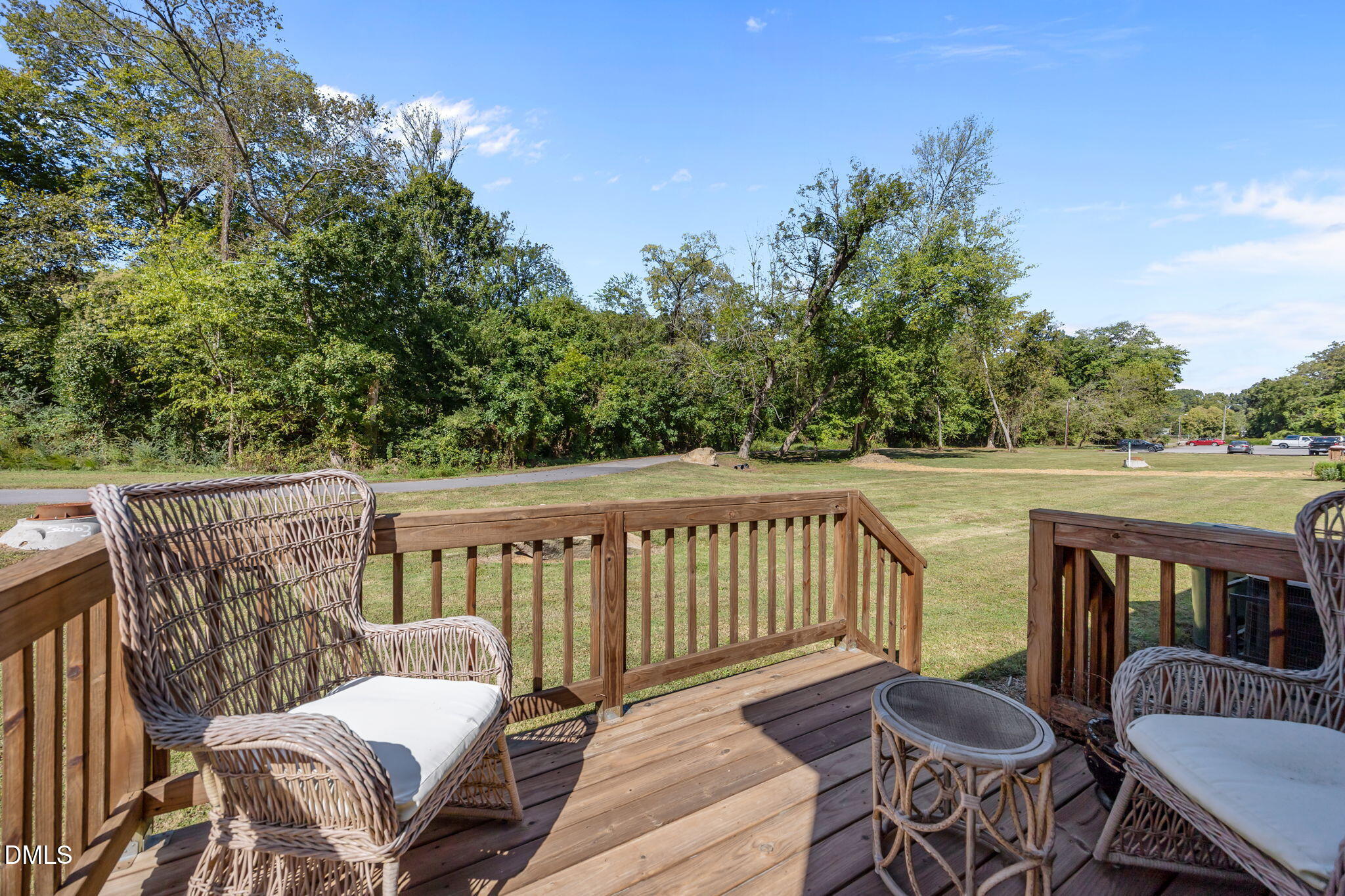 1316 South State Street, Unit D Raleigh, NC 27610 - Photo 26 of 36 a view of a chair and table on the deck