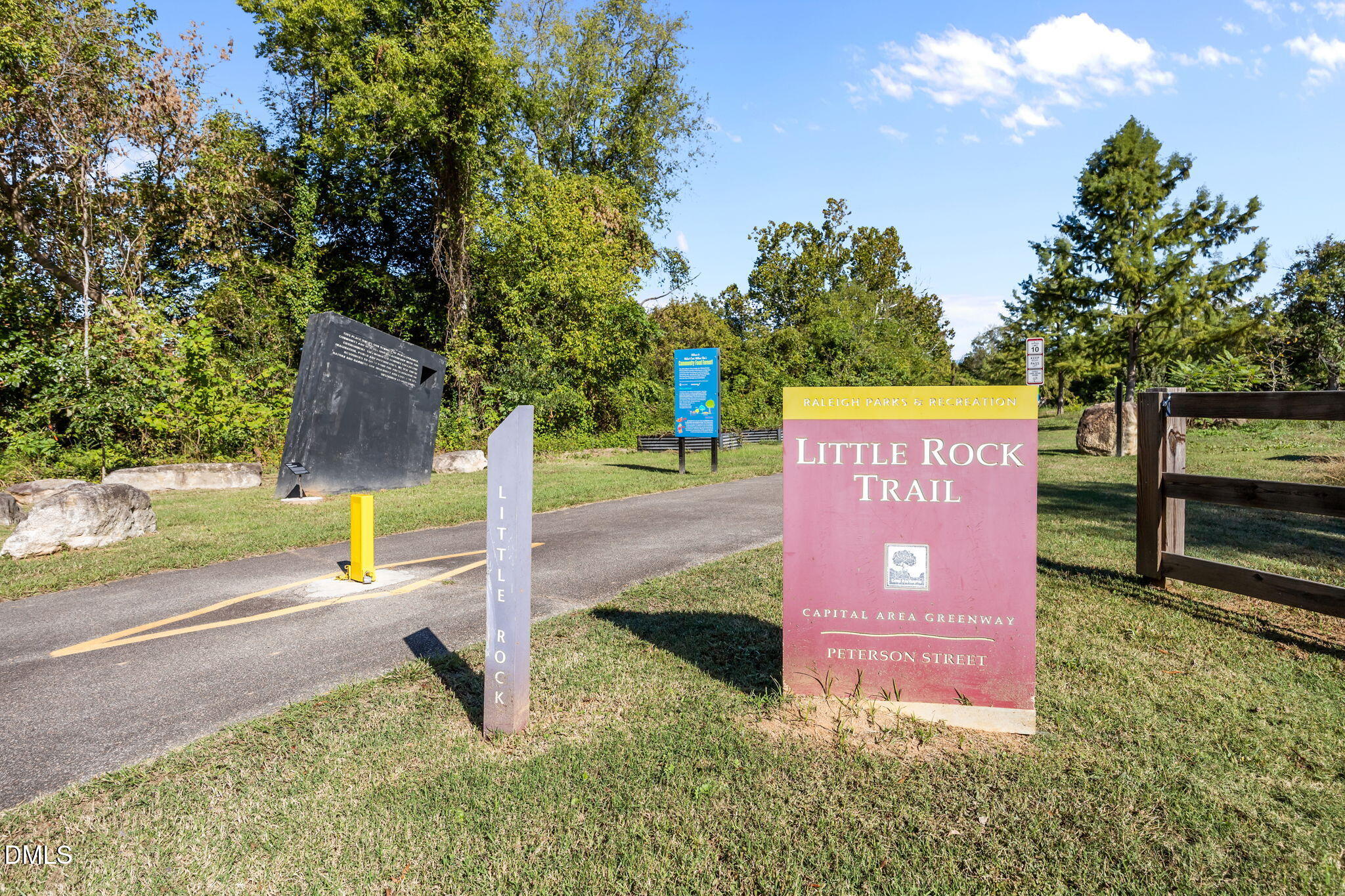 1316 South State Street, Unit D Raleigh, NC 27610 - Photo 28 of 36 a sign board with parking space