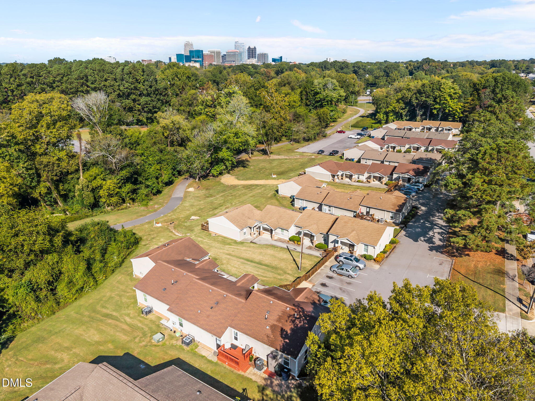 1316 South State Street, Unit D Raleigh, NC 27610 - Photo 36 of 36 an aerial view of residential houses with outdoor space