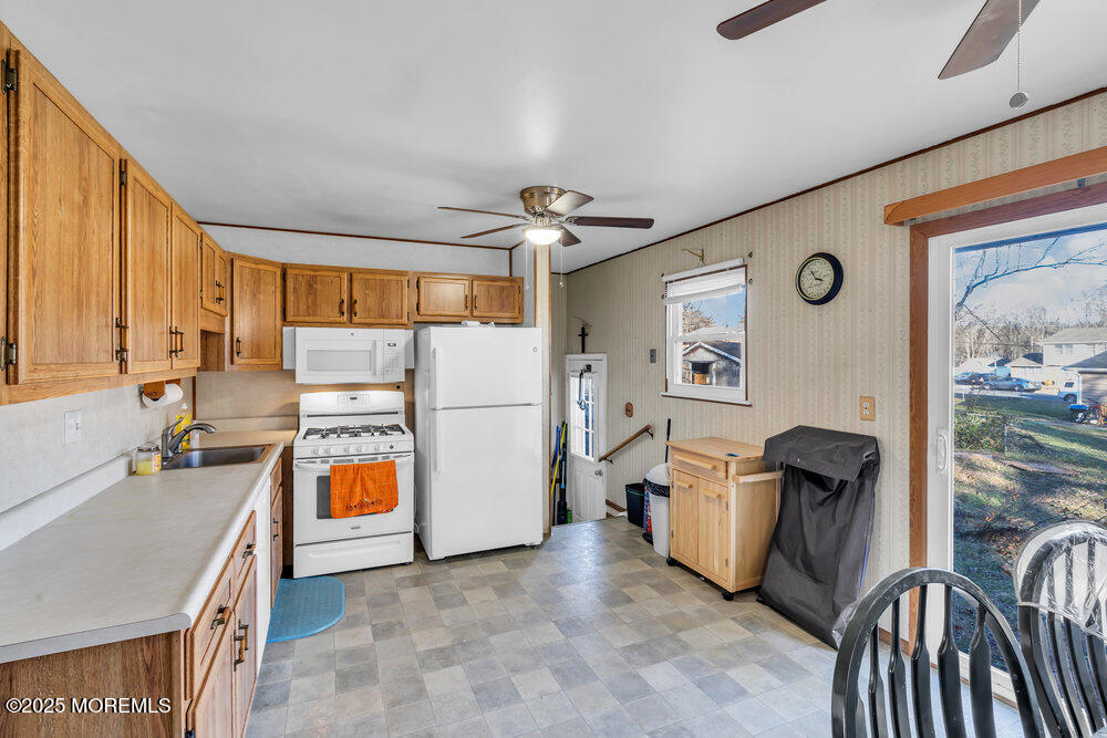 2 Drew Court Jackson, NJ 08527 - Photo 10 of 26 a view of a storage & utility room with washer and dryer