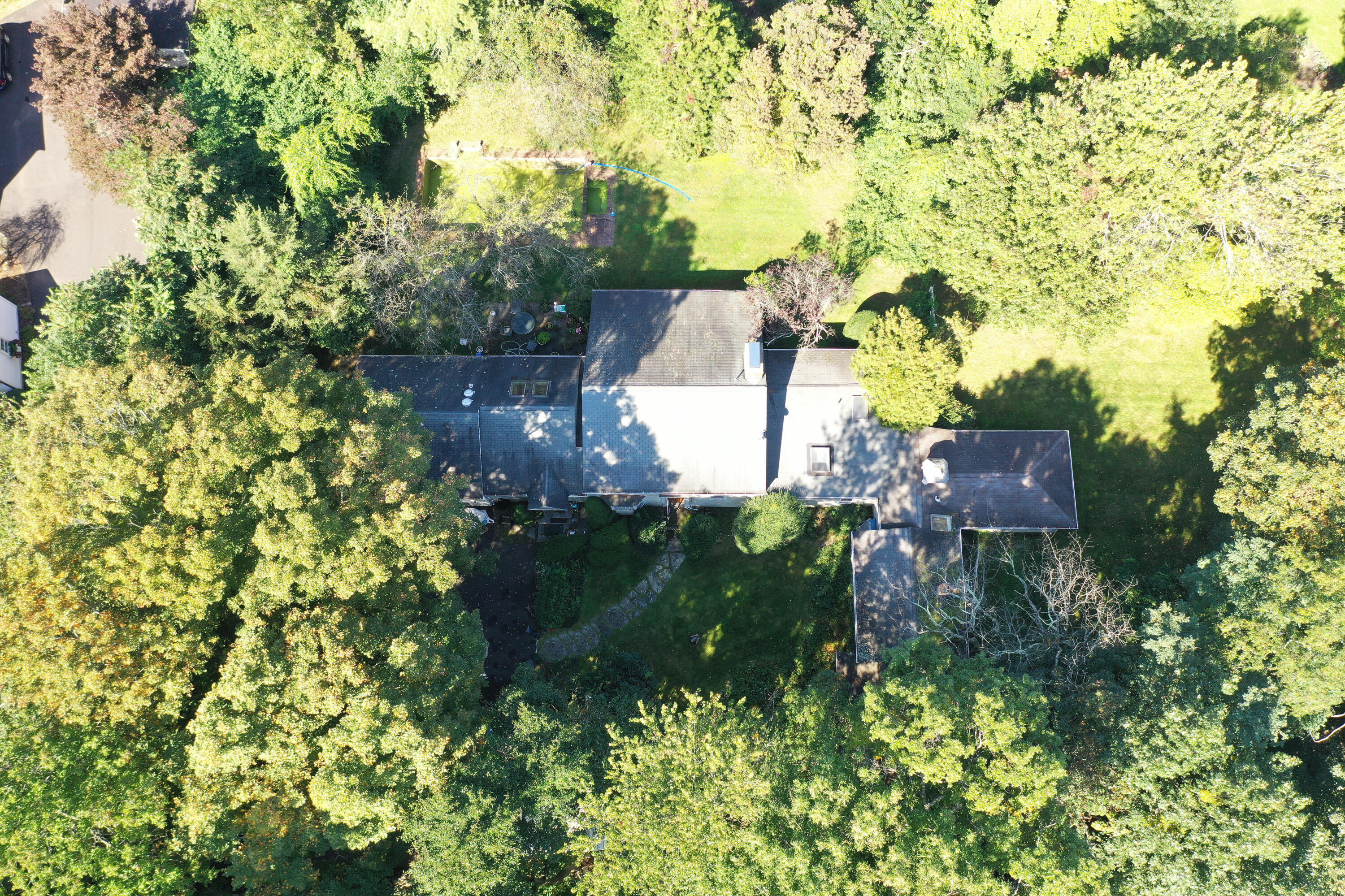 17 R Old Farm Road Darien, CT 06820 - Photo 1 of 4 an aerial view of residential house with outdoor space and trees all around