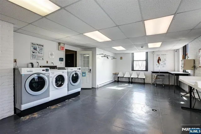 a view of a hallway with seating area
