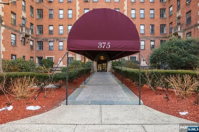 a view of swimming pool with outdoor seating