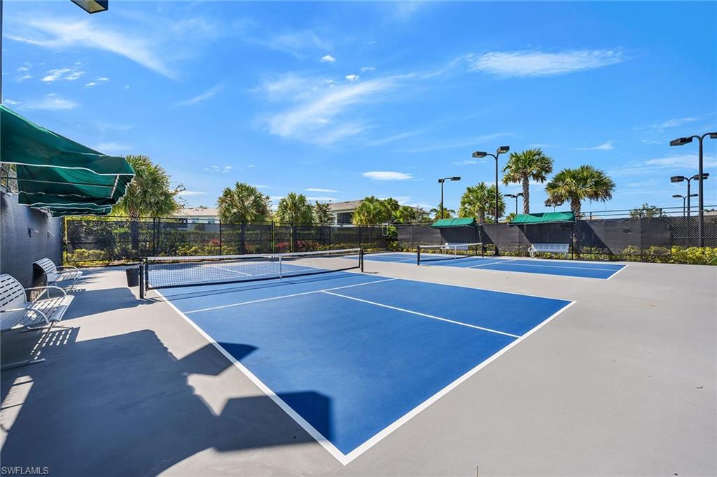 9020 Mayreau Way Naples, FL 34114 - Photo 25 of 28 a view of a tennis court