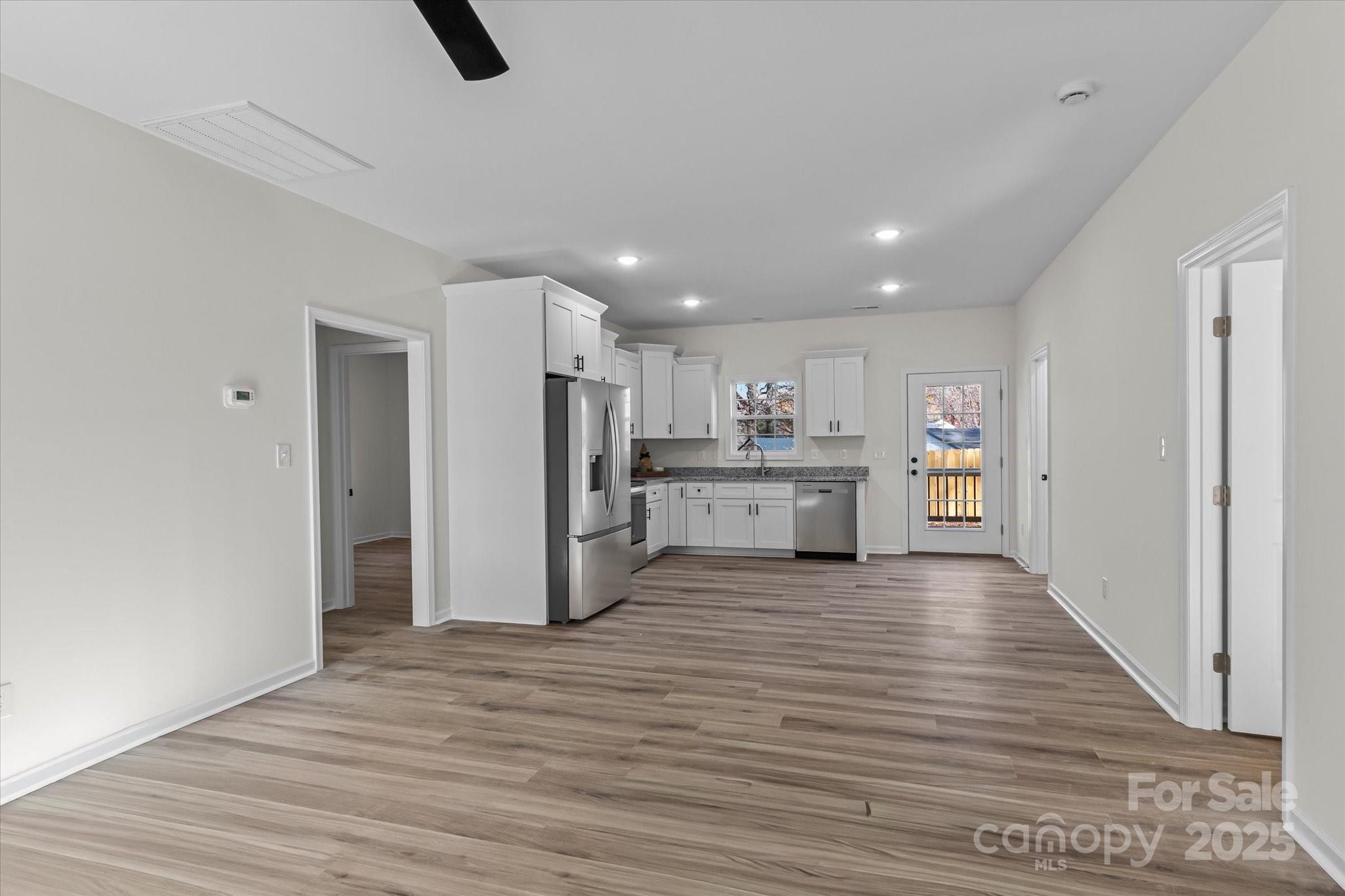402 North Ward Avenue High Point, NC 27262 - Photo 4 of 24 a view of a kitchen with wooden floor