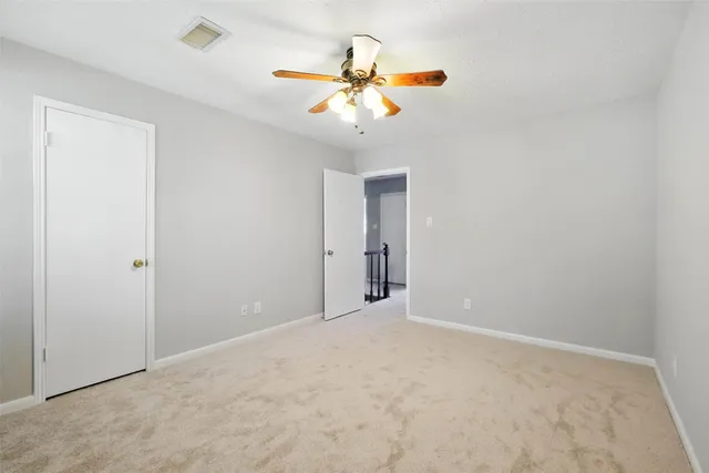 a view of a house with a large window